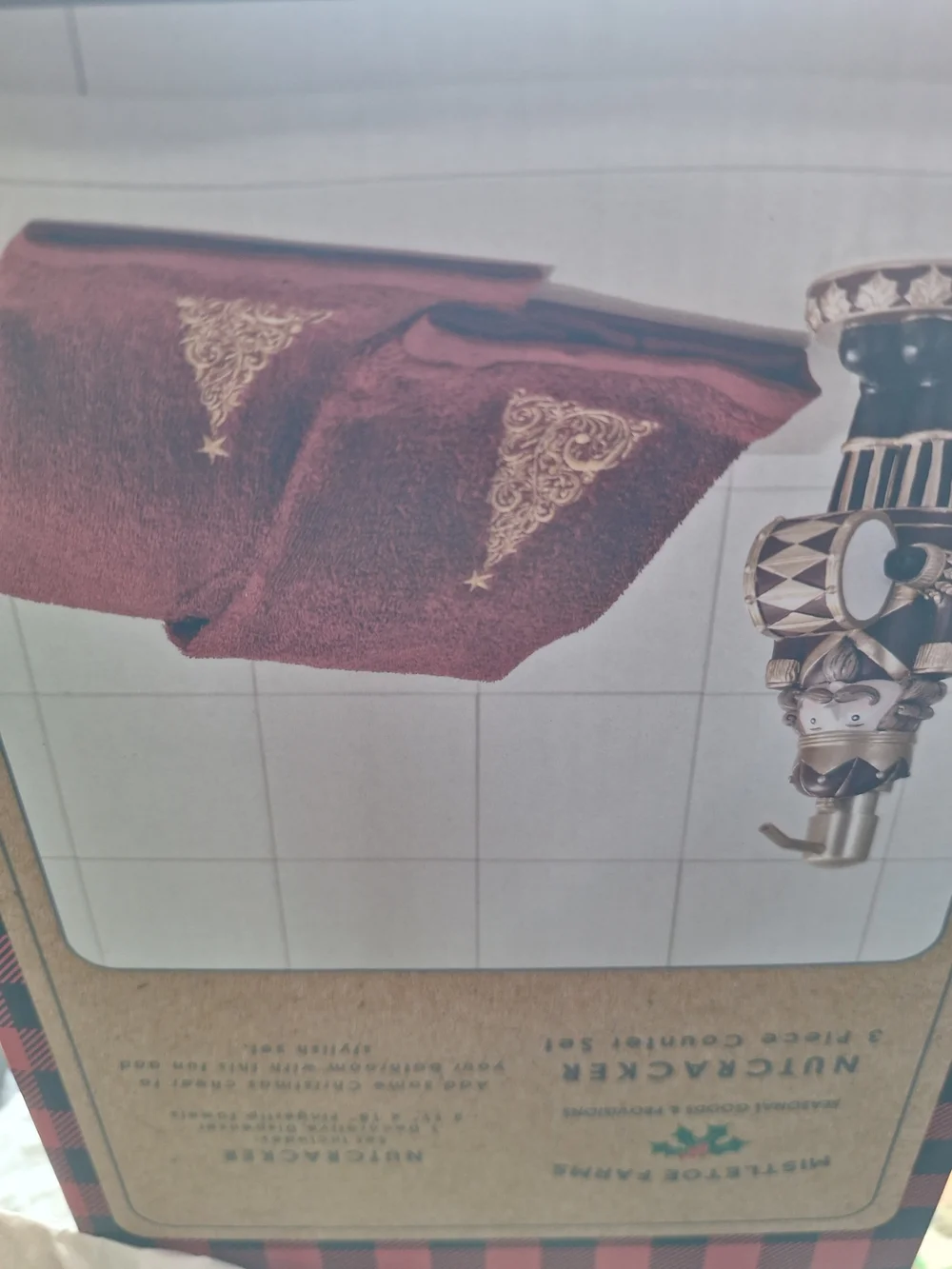 This is a 3-piece holiday bathroom counter set by Mistletoe Farms,